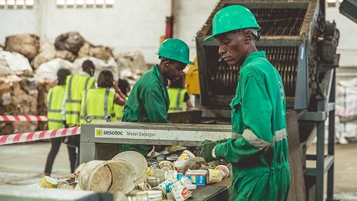 mr. green africa employees work at a recycling facility