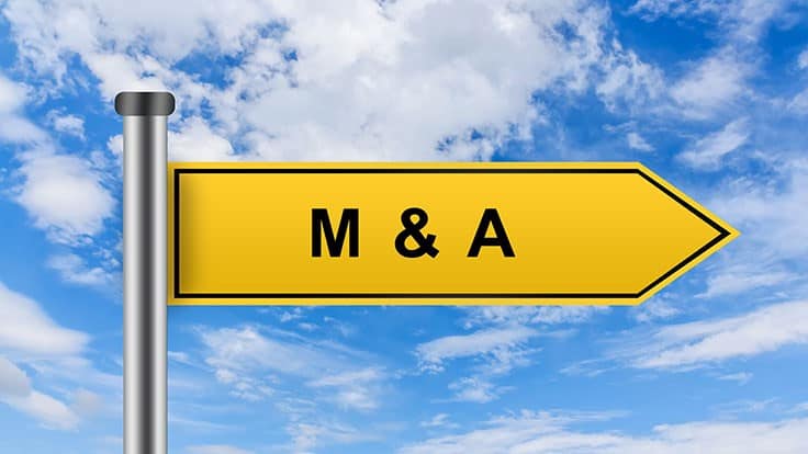 yellow sign that says M&A on blue sky background