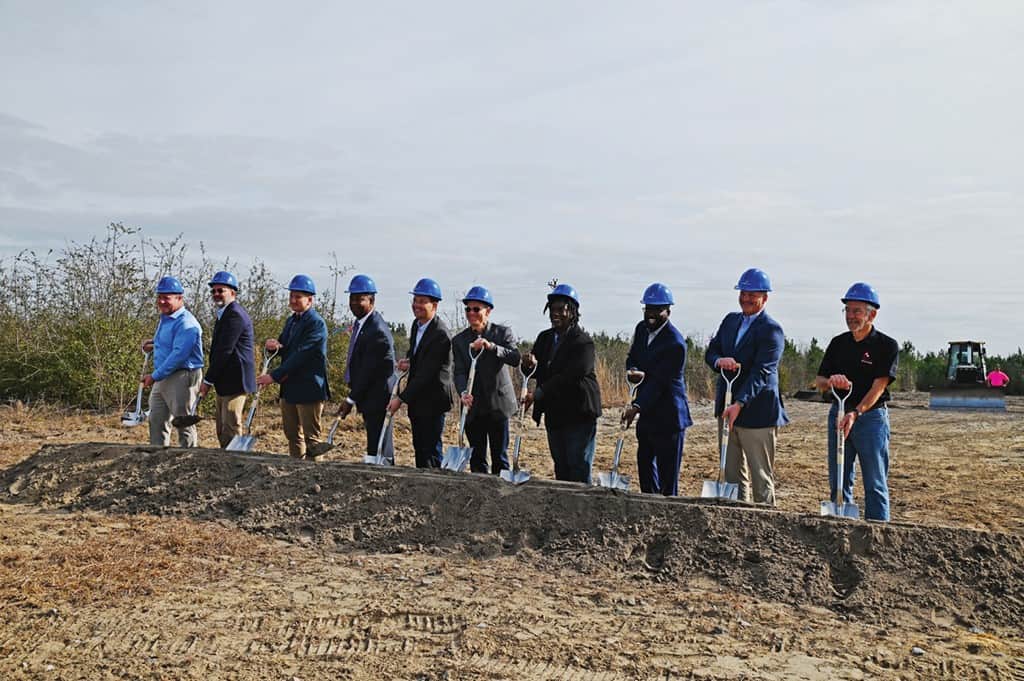 Ten people wield shovels at the groundbreaking for PureCycle's plastics recycling facility in Augusta, Georgia.