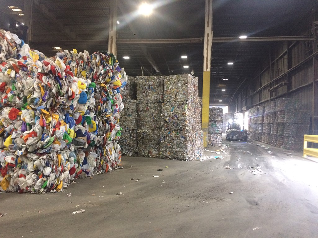 bales of plastic in a MRF