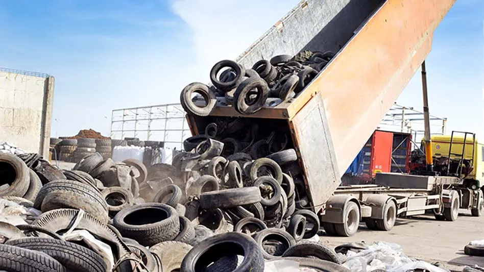 Truck dumping tires for recycling