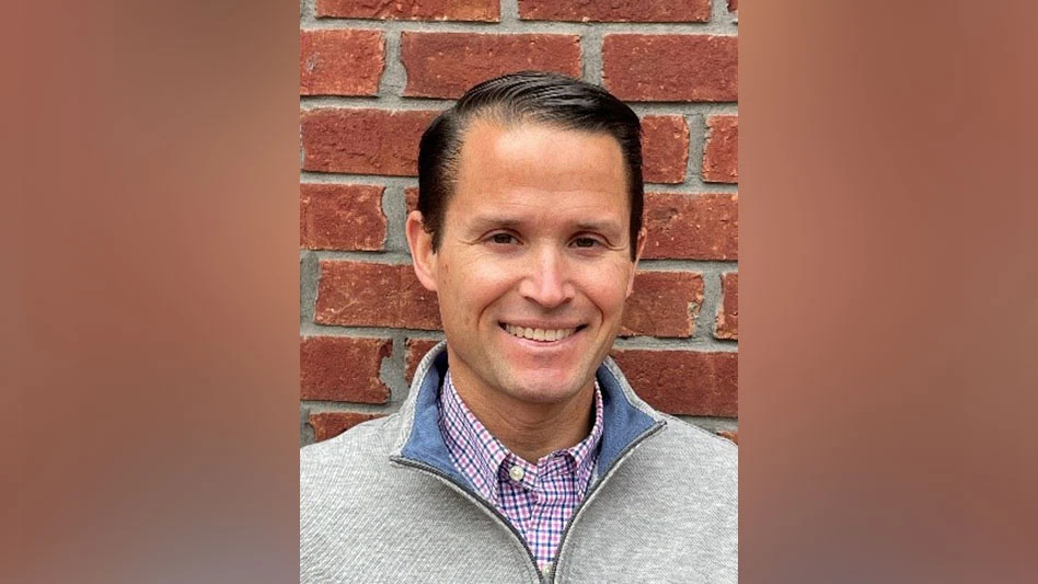 toby alexander a smiling man with dark hair