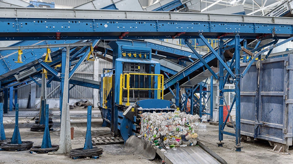 recycling compactor at recycling facility
