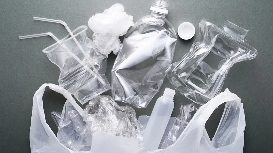 single use plastic laid out on a gray background
