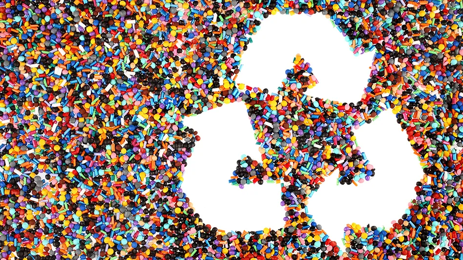 recycling symbol in plastic granules
