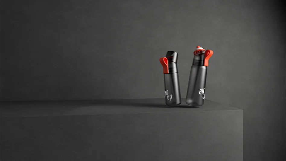 two gray water bottles with orange accents