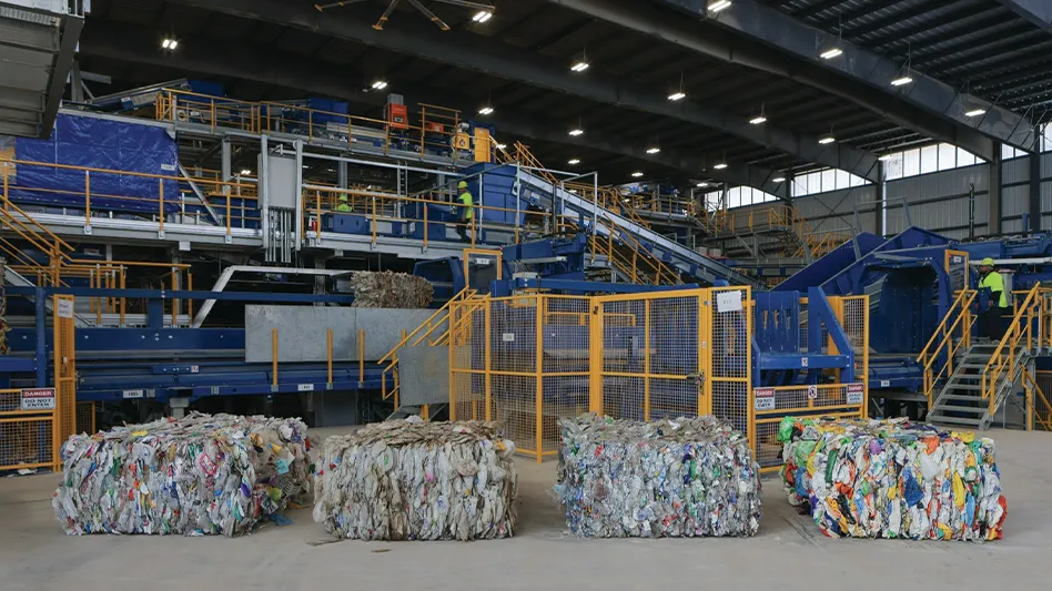 Plastic bales sit in front of processing equipment inside the Republic Services Polymer Center in Las Vegas.