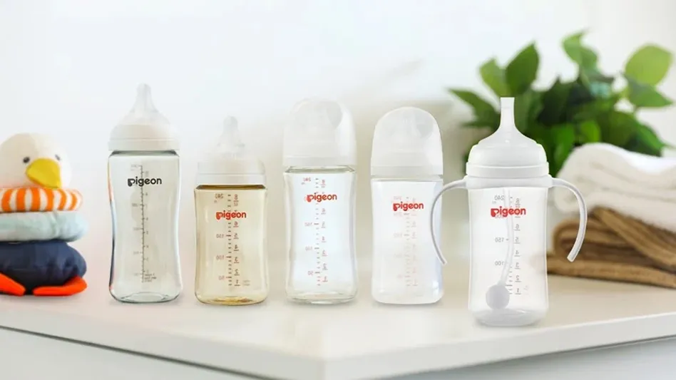 five nursing bottles on a counter