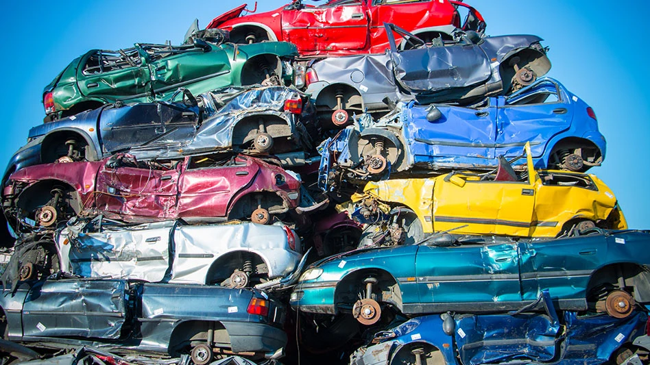 a pile of colorful crapped cars