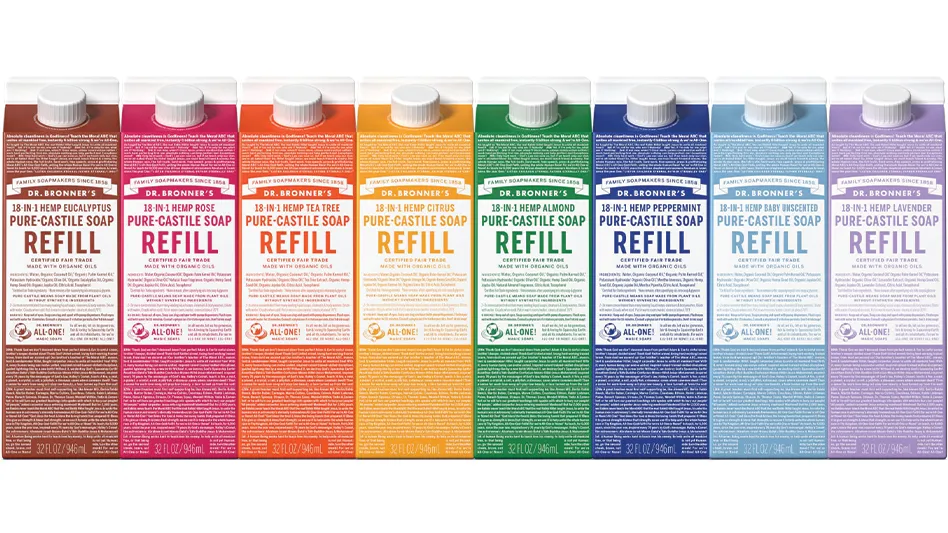 A lineup of Dr. Bronner's Pure-Castile liquid soap refill cartons in various colors.