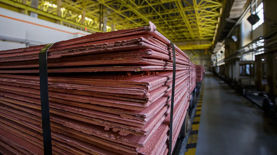 a stack of copper cathode in a warehouse