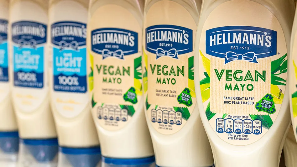 hellmanns mayo bottles lined up on a shelf