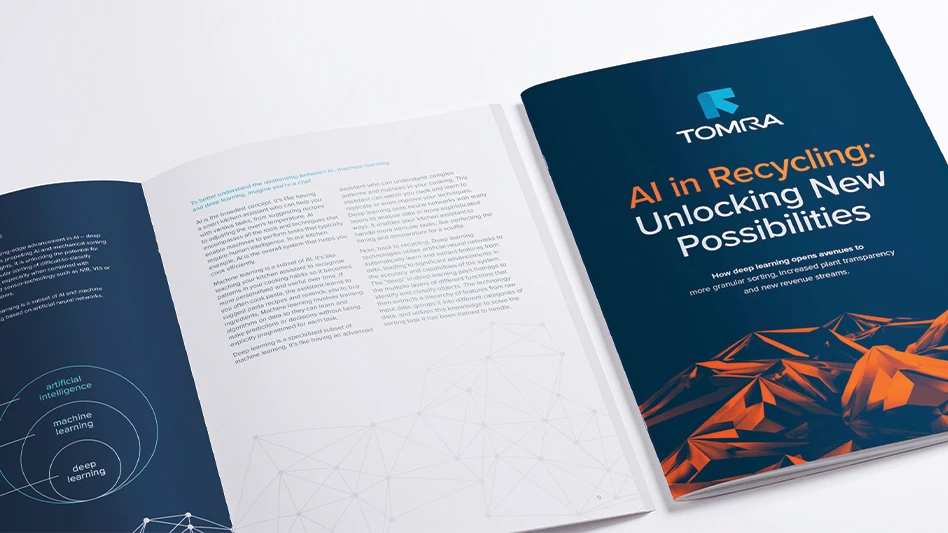 Pages of a book spread out on a white surface.