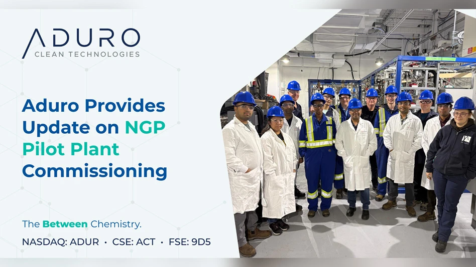 aduro clean technologies group of people in white coats and blue hard hats smiling