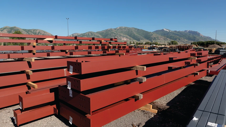 Steel products sit in an outdoor environment.