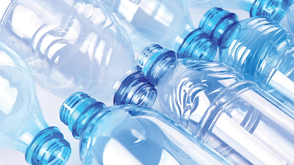 A lineup of clear plastic water bottles.