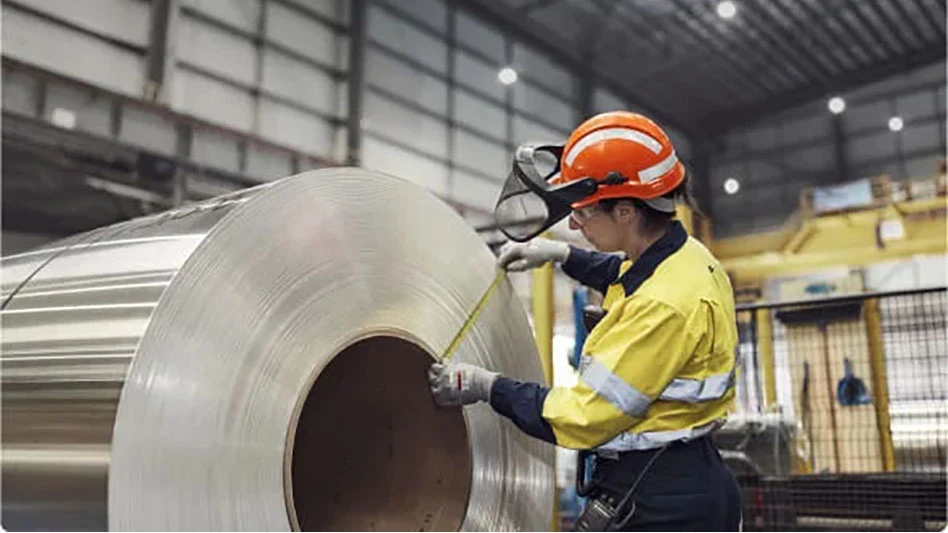 worker and steel roll