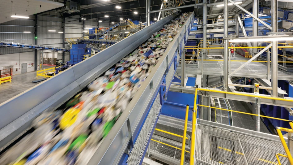 Recyclable materials move along a conveyor belt.